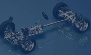 Detailansicht eines Fahrzeugchassis mit RWD Antrieb, Getriebe und Lenkrad.