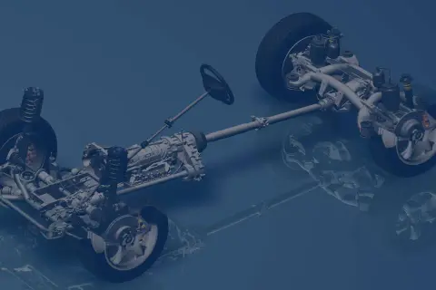 Detailansicht eines Fahrzeugchassis mit RWD Antrieb, Getriebe und Lenkrad.