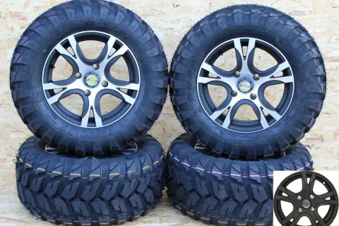 Vier neue All-Terrain-Reifen 14 Zoll mit grobstolligem Profil, bereit für jedes Abenteuer.