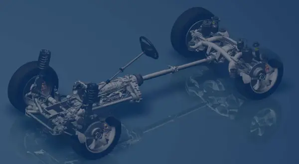 Detailansicht eines Fahrzeugchassis mit RWD Antrieb, Getriebe und Lenkrad.