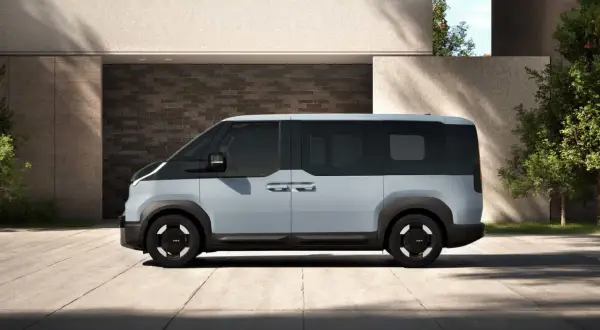 Der futuristische Kia PV5 in Hellgrau und Schwarz, ideal für Ihr Kia PV5 Leasing.