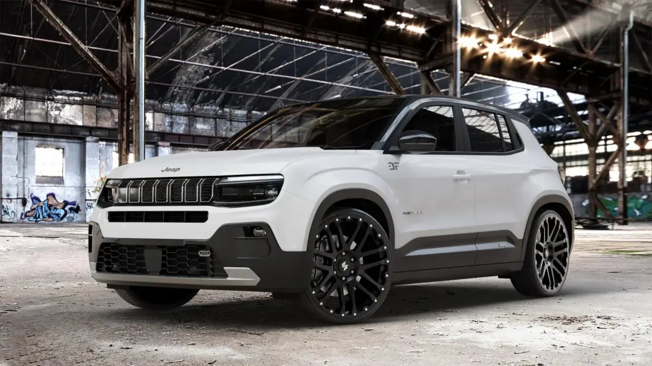 Weißer Jeep mit auffälligen schwarzen Alufelgen 22 Zoll in einer alten Fabrikhalle.