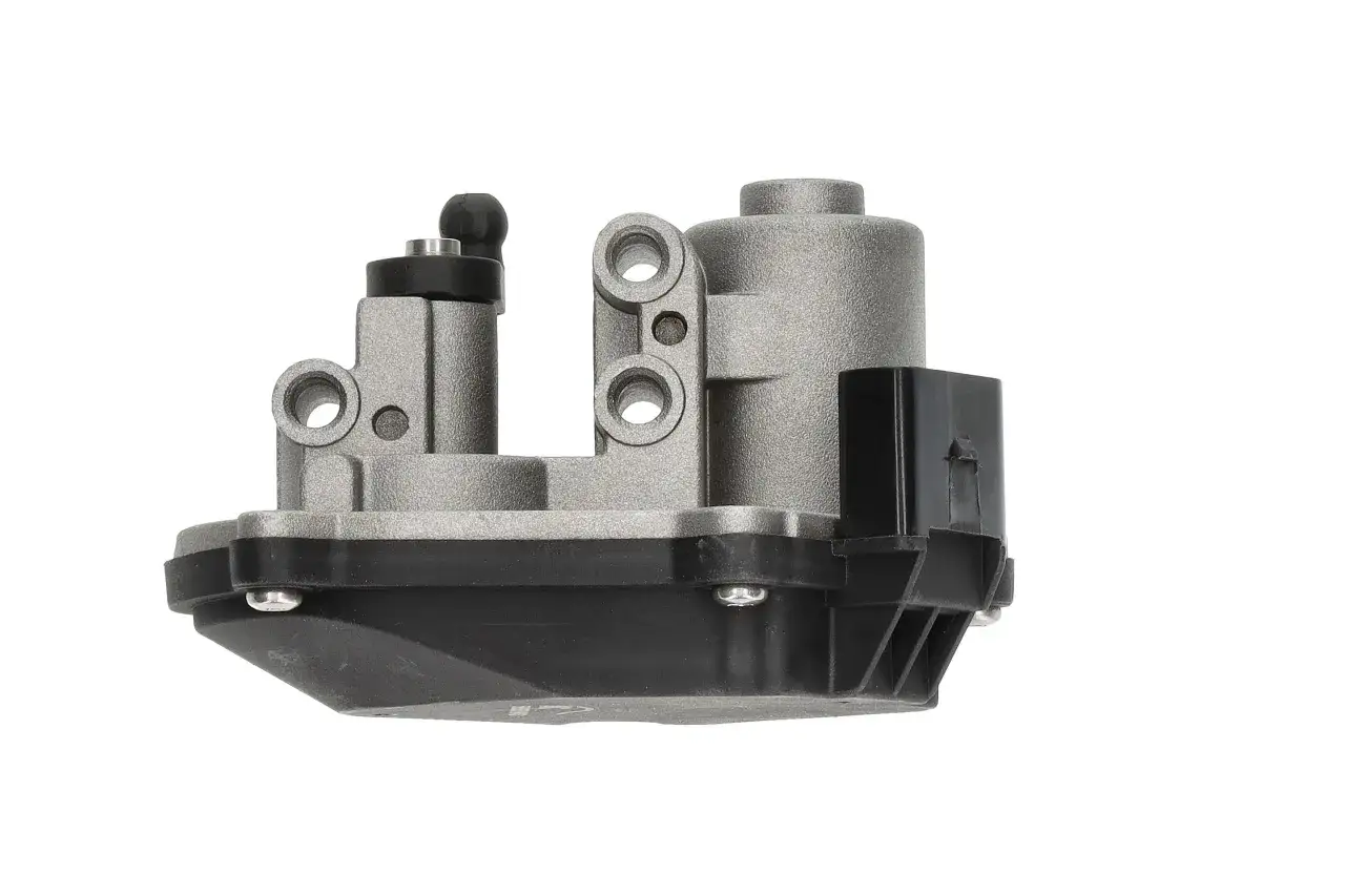 Ein Stellmotor für die Drallklappenfunktion, mit silbernem Metallgehäuse und schwarzem Kunststoffanschluss.